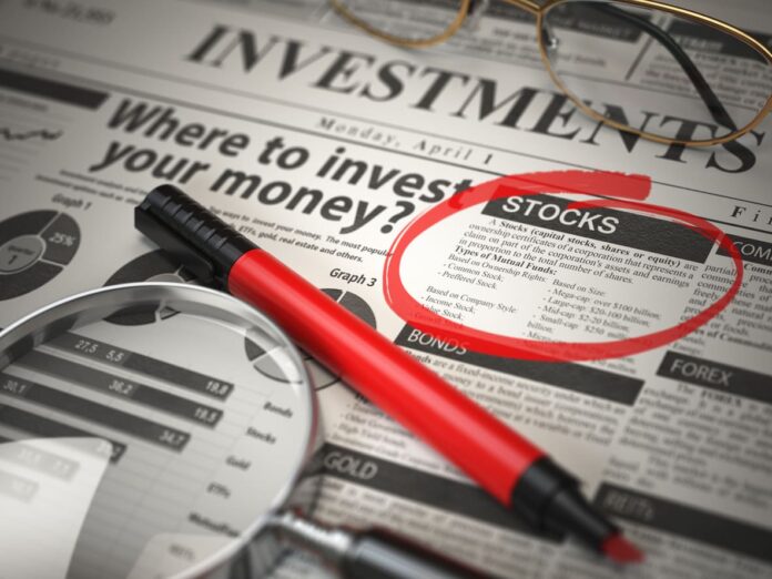 Financial decisions influenced by market news, stocks circled on paper