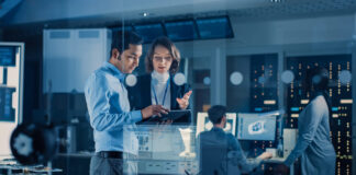 Team of Industrial Engineers, Developers Work on Engine Design Using Computers