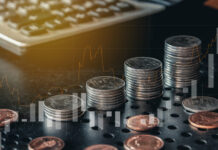 Description Stack of money coin with trading graph for financial investment