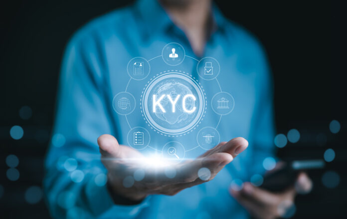 KYC verification concept. Businessman hold glowing digital representation of KYC (Know Your Customer) with compliance and security icons, symbolizing customer identity verification in business. E KYC, Businessman hold glowing digital representation of KYC (Know Your Customer) with compliance and security icons, symbolizing customer identity verification in business
