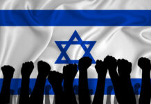 Silhouette of raised arms and clenched fists on the background of the flag of Israel.