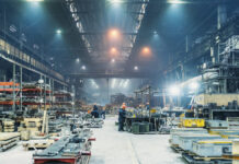 Interior of metalworking factory workshop hangar. Modern industrial enterprise production