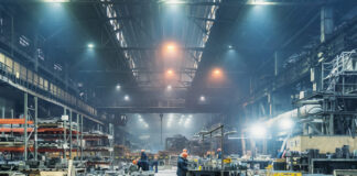 Interior of metalworking factory workshop hangar. Modern industrial enterprise production