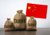 China trade tariffs, sanction, trade tax. Bags with different tariffs and chinese flag. Conflict between USA and China.