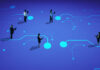 Business people distributed over digital world map, interacting via glowing nodes, reflecting cross-border connectivity.