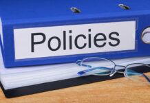 Policies concept with word on the folder.