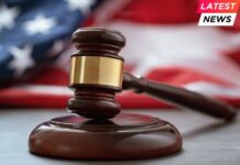 Close up of wooden judge gavel over the american