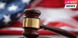 Close up of wooden judge gavel over the american
