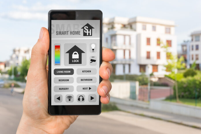 Smartphone with remote smart home control system Smartphone with remote smart home control system - futuristic smart home concept