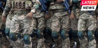 Military soldiers march in a parade with weapon