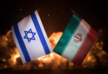 political conflicts between nations. Israel and Iran flags