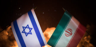 political conflicts between nations. Israel and Iran flags