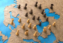 symbol of geopolitics in the world with chess pieces.