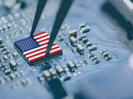 Flag of USA on a processor, CPU Central processing Unit or GPU microchip on a motherboard.