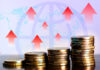 Global Economic Growth Illustrated with Rising Coin Stacks
