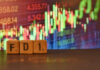 A close up picture of letters FDI . Foreign direct investment will boost up the economy.