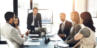 Discussion, teamwork and financial advisors with company stocks, trading or profit growth in workplace.