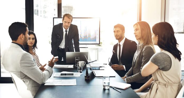 Discussion, teamwork and financial advisors with company stocks, trading or profit growth in workplace.