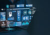 Businessman using AI agents on screen, including chatbots, AI assistants, and data analytics tools on a laptop. Chatbot, Ai agentic workflows.