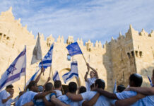 People of Israel waving their flag