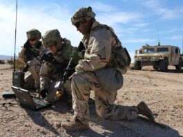 Cyberwars: How Far Can They Go? (Left to right) Spc. Ashley Lethrud-Adams, PFC Kleeman Avery, and Sgt. Alexander Lecea, cyberspace operations specialists with the Expeditionary Cyber Support Detachment, 782nd Military Intelligence Battalion (Cyber), provide support to the 1st Cavalry Division at the National Training Center.