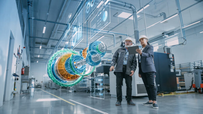 Factory Digitalization: Two Industrial Engineers Use Tablet Computer, Analysing Data about a 3D Model of Green Energy Engine. Industry 4 High-Tech Electronics Facility with Manufacturing Products