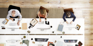 Office workers using technology in the workplace to adopt AI