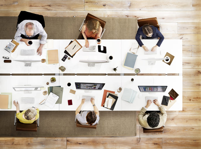 iStock-576894492 (1) Office workers using technology in the workplace to adopt AI