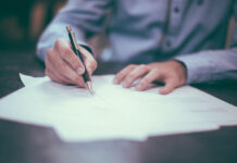 lawyer legal paper pen sign signature signing writer writing