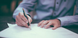 lawyer legal paper pen sign signature signing writer writing