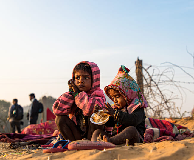 portrait of a poor kid eating food in gaza. Famine in gaza concept