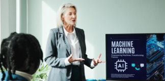 Business woman, conference room and machine learning presentation on screen for innovation, idea and training