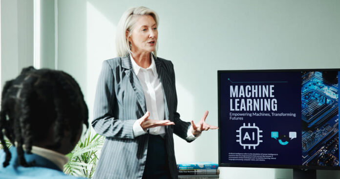 iStock-2222472847 (1) Business woman, conference room and machine learning presentation on screen for innovation, idea and training