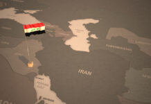 Time for Change in the Middle East Flag on the map of iraq. Vintage Map and Flag of middle east, arab Countries Series
