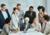 Practical Strategies to Improve Staff Retention Using Company Perks Boss together with the employees having a meeting