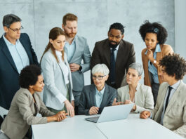 Practical Strategies to Improve Staff Retention Using Company Perks Boss together with the employees having a meeting