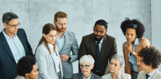 Boss together with the employees having a meeting