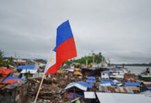 How Philippines Chose to Sideline Climate Security Houses in the Philippines destroyed by Typhoon
