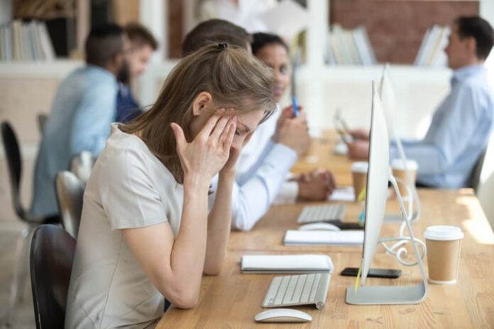 iStock-1071915624 (1) Woman feeling tired of AI workslop