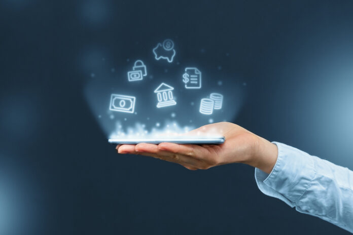 Person holds a smartphone with mobile banking icons projection. Person holds a smartphone on White-Label Banking Software with mobile banking icons projection