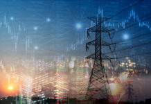 Market stock graph and information with city light and electricity and energy facility industry and business