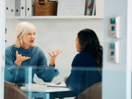 Using Employee Feedback to Help Improve Your Benefits Strategy employee giving feedback to the CEO