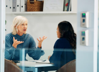 Using Employee Feedback to Help Improve Your Benefits Strategy employee giving feedback to the CEO