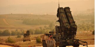 U.S service members stand by a Patriot missile battery in Gaziantep, Turkey