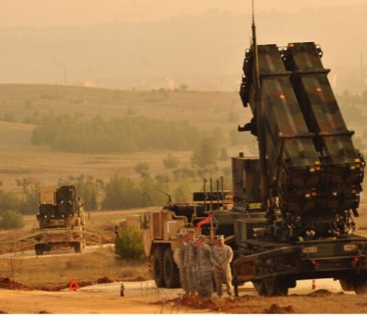 U.S service members stand by a Patriot missile battery in Gaziantep, Turkey