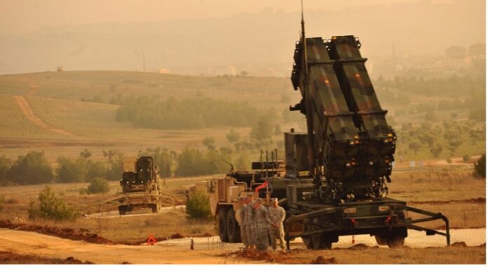 U.S service members stand by a Patriot missile battery in Gaziantep, Turkey