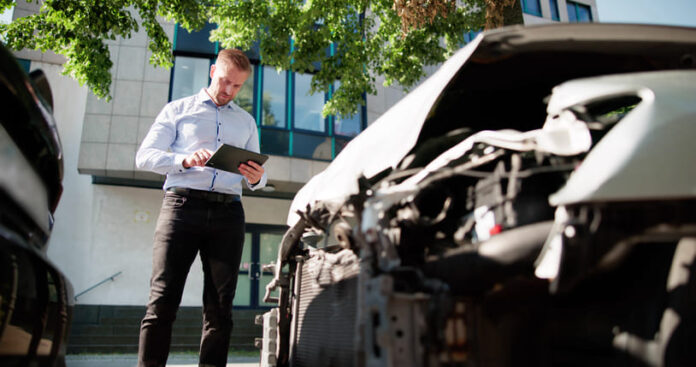 iStock-2226845657 (1) insurance adjuster