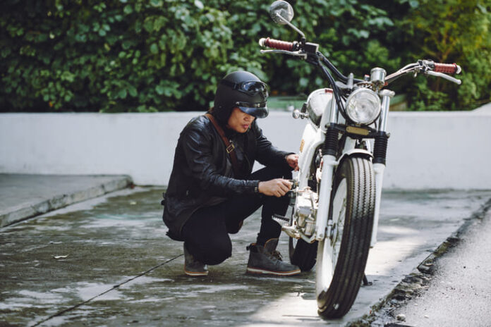 Small Breakage of Vintage Motorcycle with dents
