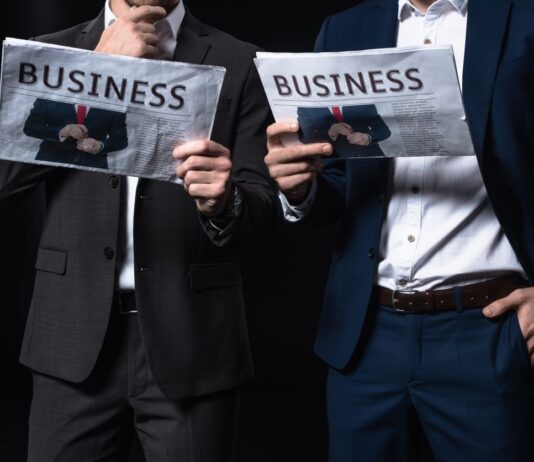 The Impact of Injunctions on Gazette Advertisements in Corporate Disputes Injunctions and Gazette - businessmen reading newspapers