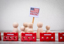 democracy = Sign with Red Barriers Representing Protest or Political Action.